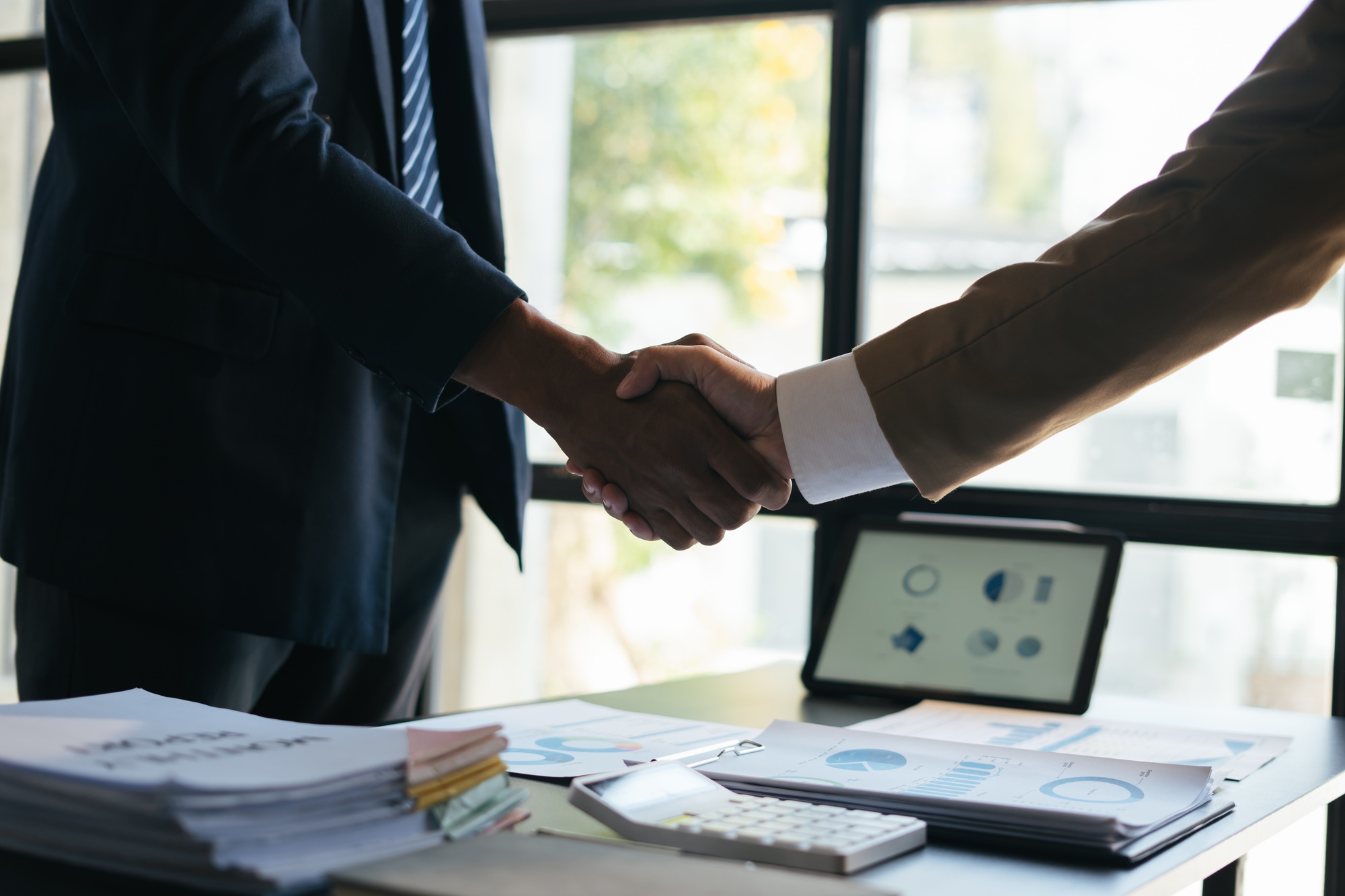 Handshake. Meeting of business people and working cooperation in the organization.